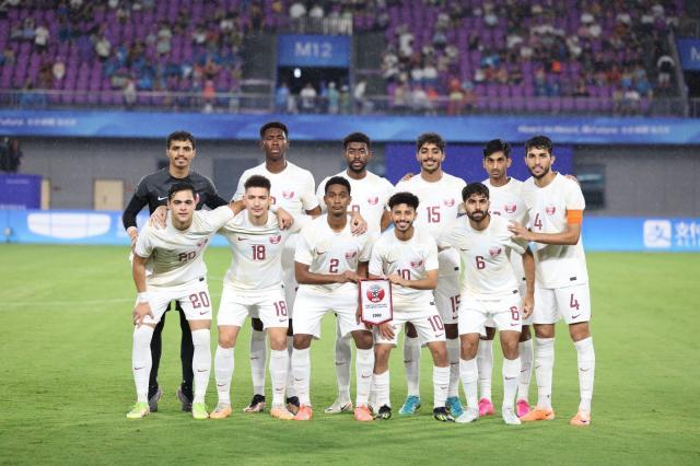 0-卡塔尔队对阵日本队的全家福.jpg